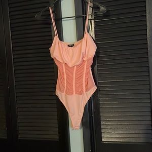 Pink lace corset like body suit size small rue 21